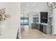 Well-designed kitchen with gray cabinetry, modern appliances, and an open layout at 216 Shady Oaks Cir, Lake Mary, FL 32746
