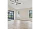 Spacious living room featuring light wood floors, windows, and sliding door at 216 Shady Oaks Cir, Lake Mary, FL 32746