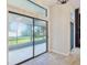 Sunlit room with sliding glass doors offering views of the backyard and outdoor space at 216 Shady Oaks Cir, Lake Mary, FL 32746