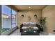 Outdoor relaxing balcony with seating, table and a view at 2167 Velvet Leaf Dr, Ocoee, FL 34761