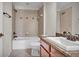 This bathroom has a tiled shower-tub and vanity at 2167 Velvet Leaf Dr, Ocoee, FL 34761