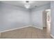 Spacious dining area with modern light fixture and neutral paint at 2167 Velvet Leaf Dr, Ocoee, FL 34761