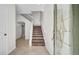 Bright foyer showcasing a staircase and tile flooring at 2167 Velvet Leaf Dr, Ocoee, FL 34761