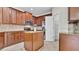 Gourmet kitchen featuring stainless appliances, central island, and ample cabinet space at 2167 Velvet Leaf Dr, Ocoee, FL 34761