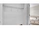 Walk-in closet leading to bathroom with separate tub at 2167 Velvet Leaf Dr, Ocoee, FL 34761