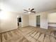Spacious main bedroom features carpet flooring, ceiling fan, and en-suite bathroom at 224 Lake Charles Dr, Davenport, FL 33837