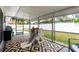 Relaxing screened in porch includes slide and other toys for hours of fun! at 2259 King Johns Ct, Winter Park, FL 32792