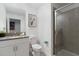 Bright bathroom featuring modern fixtures, including a glass-enclosed shower at 2400 Reading Trl, Kissimmee, FL 34746
