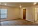 Spacious bedroom featuring neutral carpet, closet, and natural light from a bright window at 2607 Tulip Dr, Davenport, FL 33837