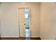 A bedroom features a door to what could be an attached bathroom or closet at 2607 Tulip Dr, Davenport, FL 33837