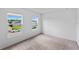 Bedroom features neutral carpet with two bright windows at 2730 Parkfield Rd, St Cloud, FL 34772
