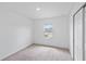 Bedroom features neutral carpet and a window with ample natural light at 2730 Parkfield Rd, St Cloud, FL 34772