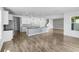 Open-concept kitchen with a large island and stainless steel appliances offers lots of space at 2730 Parkfield Rd, St Cloud, FL 34772