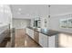 Open-concept kitchen featuring a large island and a seamless connection to the living area at 2730 Parkfield Rd, St Cloud, FL 34772