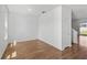 Bright living room featuring sleek hardwood floors and fresh paint at 2730 Parkfield Rd, St Cloud, FL 34772