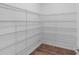 Spacious walk-in pantry with ample shelving for organized storage at 2730 Parkfield Rd, St Cloud, FL 34772