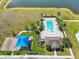 Aerial shot of the community pool and playground area at 2730 Parkfield Rd, St Cloud, FL 34772