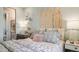 Beach themed bedroom with surf board headboard, decorated with a beachy theme and light colors at 2963 Arranmore Dr, Ormond Beach, FL 32174