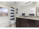 Bathroom features modern fixtures, a shower-tub, and neutral-toned decor at 309 Verona Ave, Davenport, FL 33897
