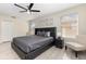 Bright bedroom with a window, ceiling fan and closet space at 309 Verona Ave, Davenport, FL 33897
