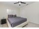 Bright and airy bedroom features a ceiling fan, closet and wood-look flooring at 309 Verona Ave, Davenport, FL 33897