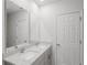 Modern bathroom showcasing double sinks with granite countertops and neutral tones at 349 Guadlupe St, Haines City, FL 33844