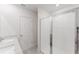 Contemporary bathroom featuring a glass-enclosed shower and a dual sink vanity with stone countertops at 349 Guadlupe St, Haines City, FL 33844