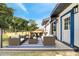 Back deck featuring outdoor seating area with comfortable seating and dining at 358 Prevo Dr, Apopka, FL 32712