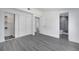 Bright bedroom featuring closet, connecting door and ensuite bathroom, plus neutral paint and flooring at 358 Prevo Dr, Apopka, FL 32712