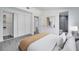 Cozy bedroom featuring closet, connecting door and ensuite bathroom, plus neutral paint and flooring at 358 Prevo Dr, Apopka, FL 32712