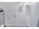 Spacious utility room with water heater, storage shelf and easy-access connections at 358 Prevo Dr, Apopka, FL 32712