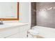 Bright bathroom featuring a single sink, toilet and bath tub combo at 3621 Conroy Rd # 738, Orlando, FL 32839