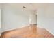 This bedroom boasts hardwood floors, creating a warm and inviting ambiance, complemented by natural light at 3621 Conroy Rd # 738, Orlando, FL 32839