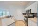 Well-equipped kitchen with stainless steel appliances, ample counter space, and white cabinetry at 3621 Conroy Rd # 738, Orlando, FL 32839