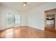 Spacious living area with a ceiling fan and hardwood floors, offering access to a view, perfect for relaxation at 3621 Conroy Rd # 738, Orlando, FL 32839