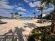 Community pool features a large pool deck, lounge chairs, and a nearby clubhouse for relaxation and recreation at 4224 Pebbles Throw Dr, Kissimmee, FL 34746