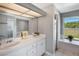 Bathroom featuring double sinks and vanity with a bathtub and walk-in shower at 4400 Walker Lake Rd, Bartow, FL 33830