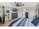 Spacious bedroom features modern ceiling fan, neutral paint, and mounted TV at 4400 Walker Lake Rd, Bartow, FL 33830