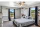 Bedroom with a cozy style with windows and hardwood look floors at 4400 Walker Lake Rd, Bartow, FL 33830
