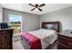 Bedroom features a large window allowing for natural light and view at 4400 Walker Lake Rd, Bartow, FL 33830