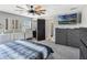Relaxing bedroom showcasing soft carpet, cool colors, and natural light at 4400 Walker Lake Rd, Bartow, FL 33830