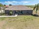 Charming single-story home with well-manicured landscaping and a welcoming front porch at 4400 Walker Lake Rd, Bartow, FL 33830