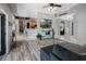 Open concept living room with decorative shelving and an adjacent dining area, creating an inviting and functional space at 4400 Walker Lake Rd, Bartow, FL 33830