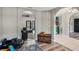 Open-concept living area with archways, leading to a living room, hallway, and pool at 4400 Walker Lake Rd, Bartow, FL 33830