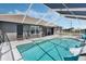 Relaxing screened in pool with a slide and spacious deck at 4400 Walker Lake Rd, Bartow, FL 33830