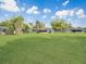 Spacious backyard with well-maintained lawn and ample space for recreation at 51 Park Ln, Debary, FL 32713