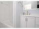 Bathroom features sleek vanity, modern fixtures, and tiled shower at 51 Park Ln, Debary, FL 32713