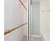 Walk-in closet with wooden clothing racks and patterned flooring at 51 Park Ln, Debary, FL 32713