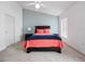 Inviting primary bedroom with vaulted ceiling, neutral carpeting, and ample natural light at 721 Rollins Dr, Davenport, FL 33837