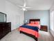 Inviting primary bedroom featuring a ceiling fan, and neutral carpeting at 721 Rollins Dr, Davenport, FL 33837